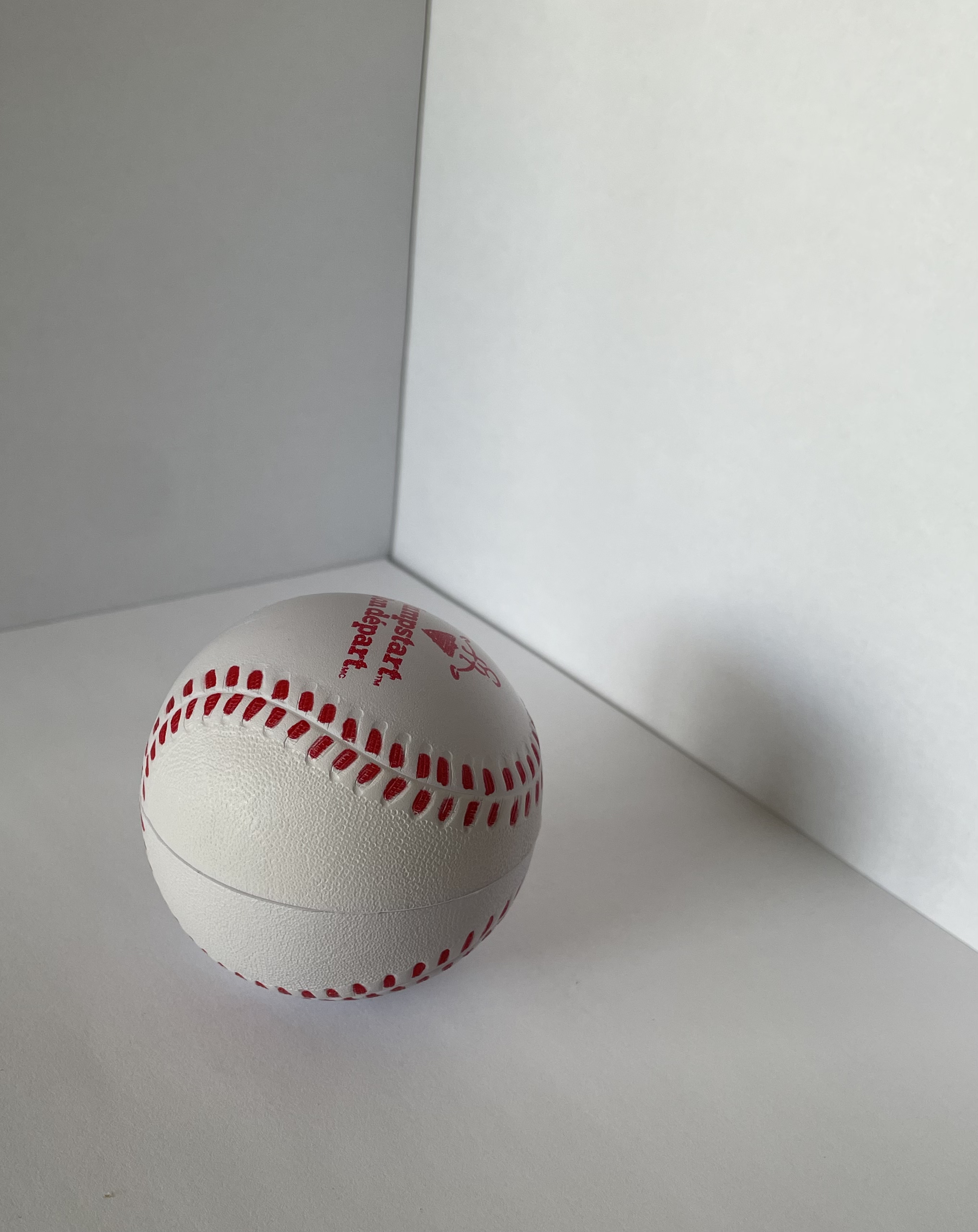 The side view of the baseball from a higher angle.