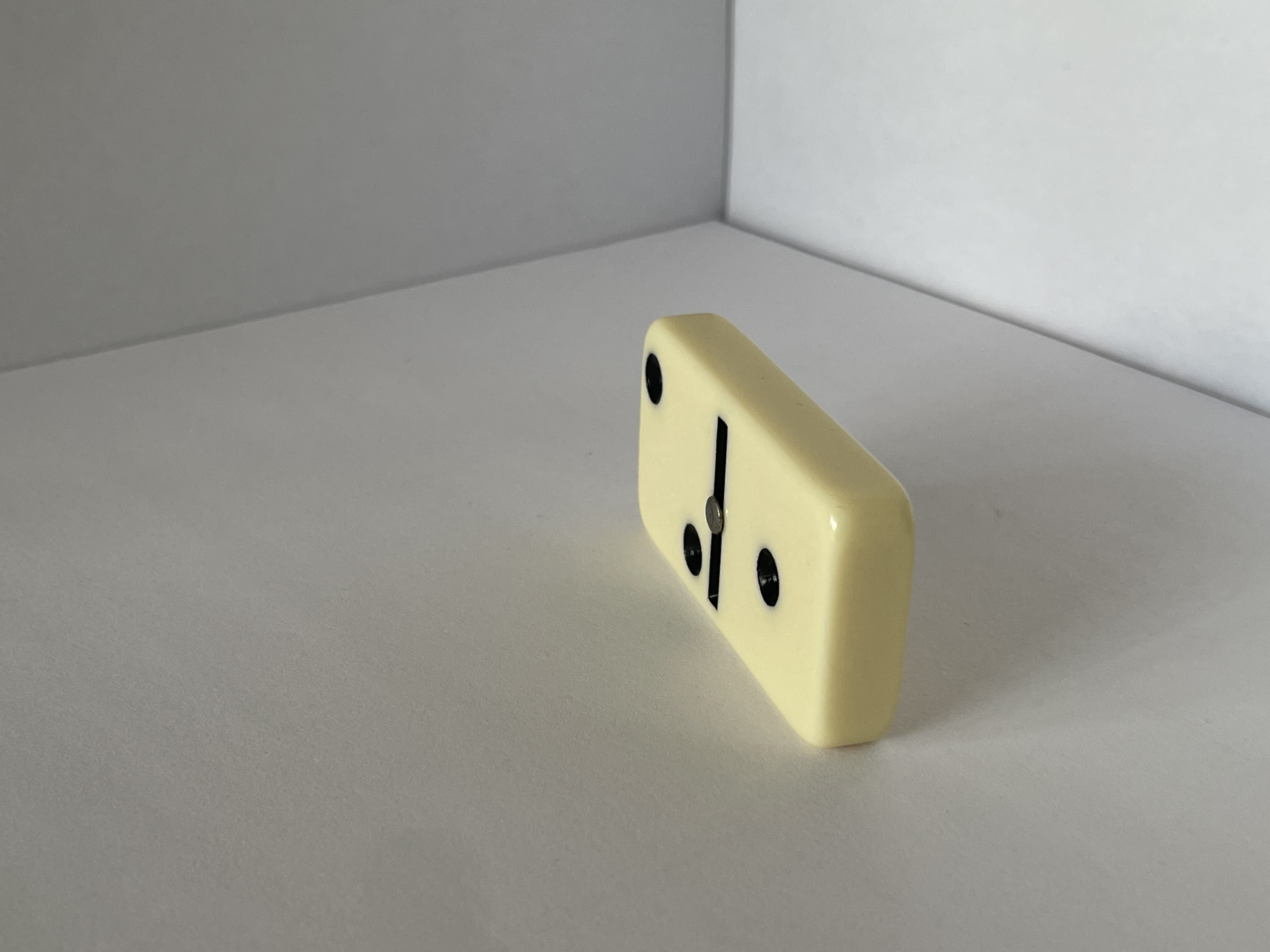 The side view of the domino.