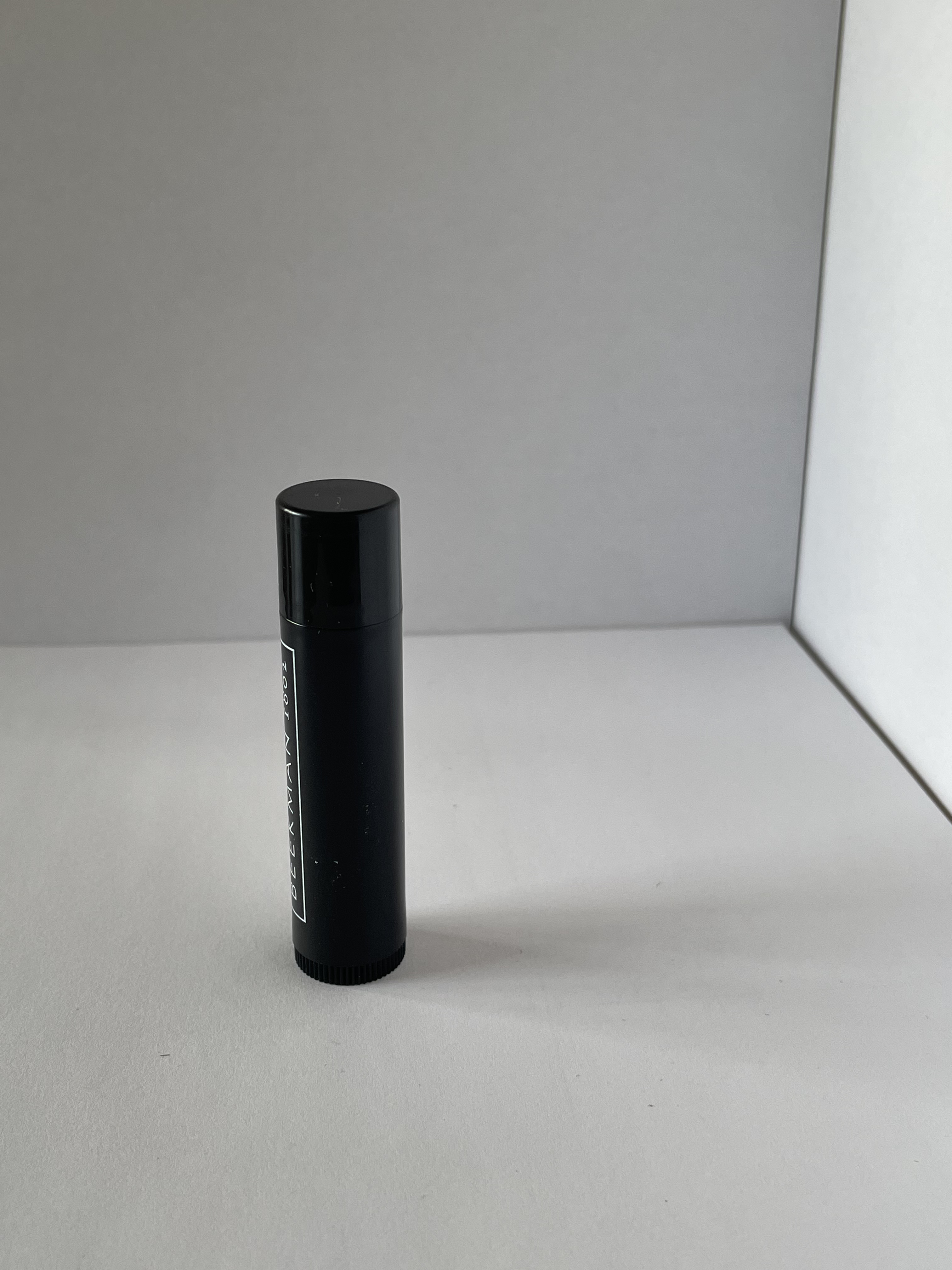The front view of the lip balm standing.
