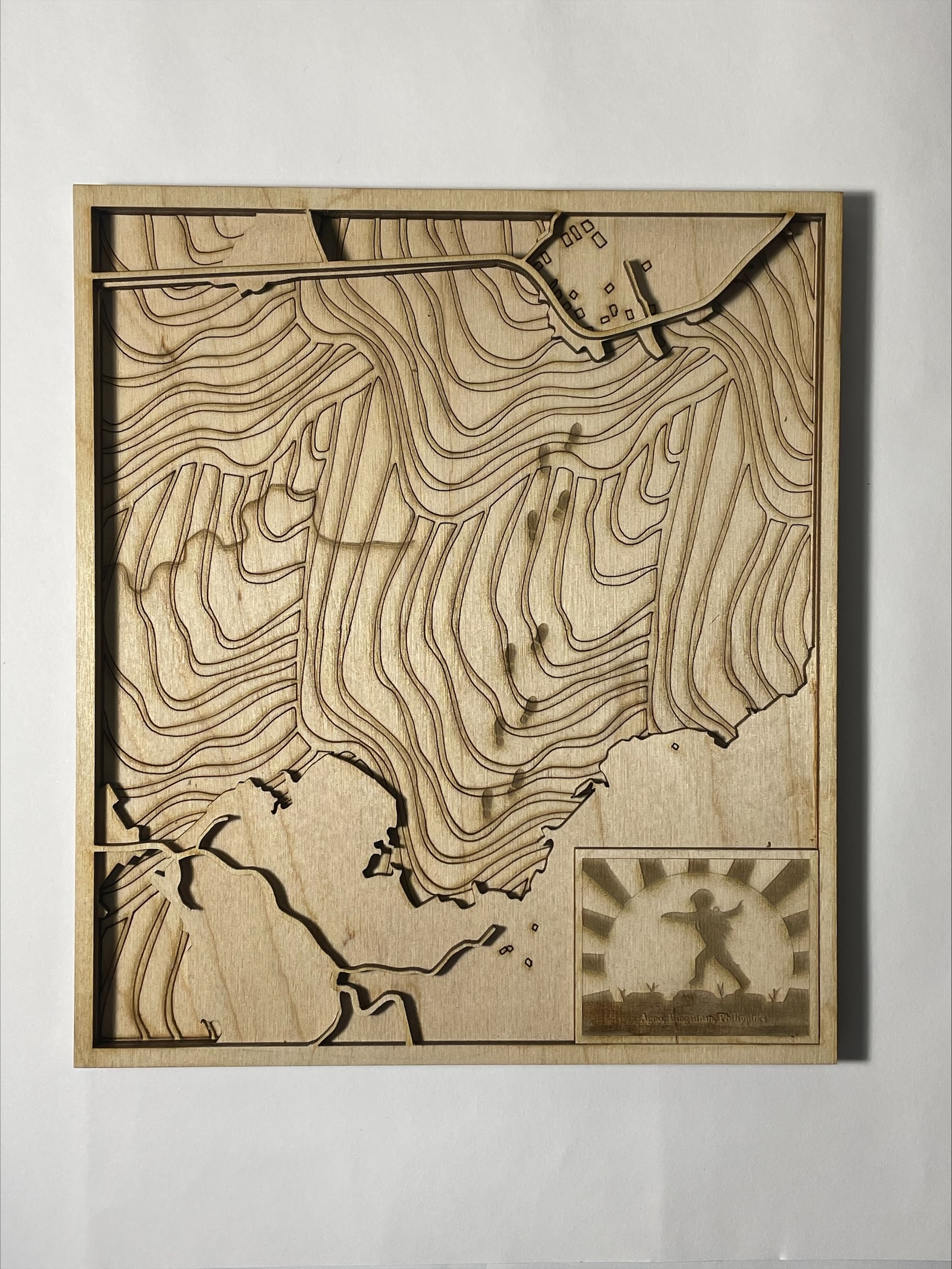 For our final project, I decided to laser cut an area using Mapbox, Illustrator, and Inkscape. The place I chose to cut out is my father's hometown back in the Philippines. He grew up in Agno, Panginasan, Philippines in a remote village by Cayungnan. In order to get to his elementary school, my aunt and him had to walk through the rice paddy fields everyday through stones.