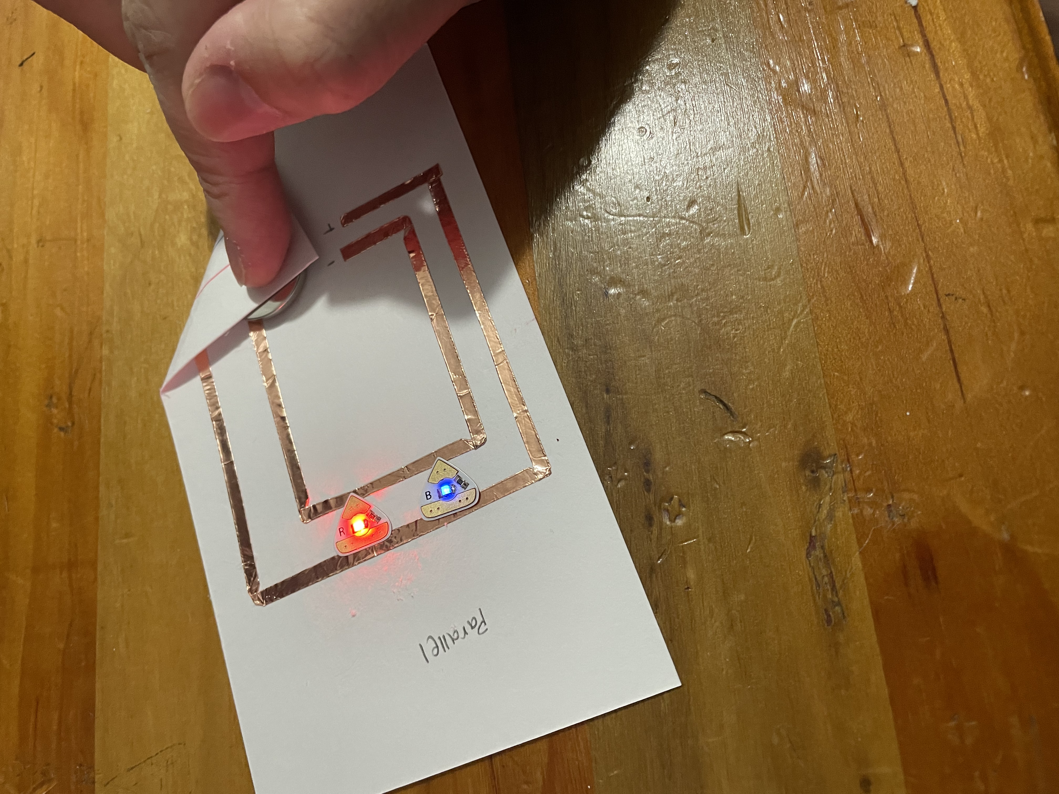 This attempt of the parallel circuit was successful! Instead of the LED lights with legs, I used the sticky ones included in our kit.