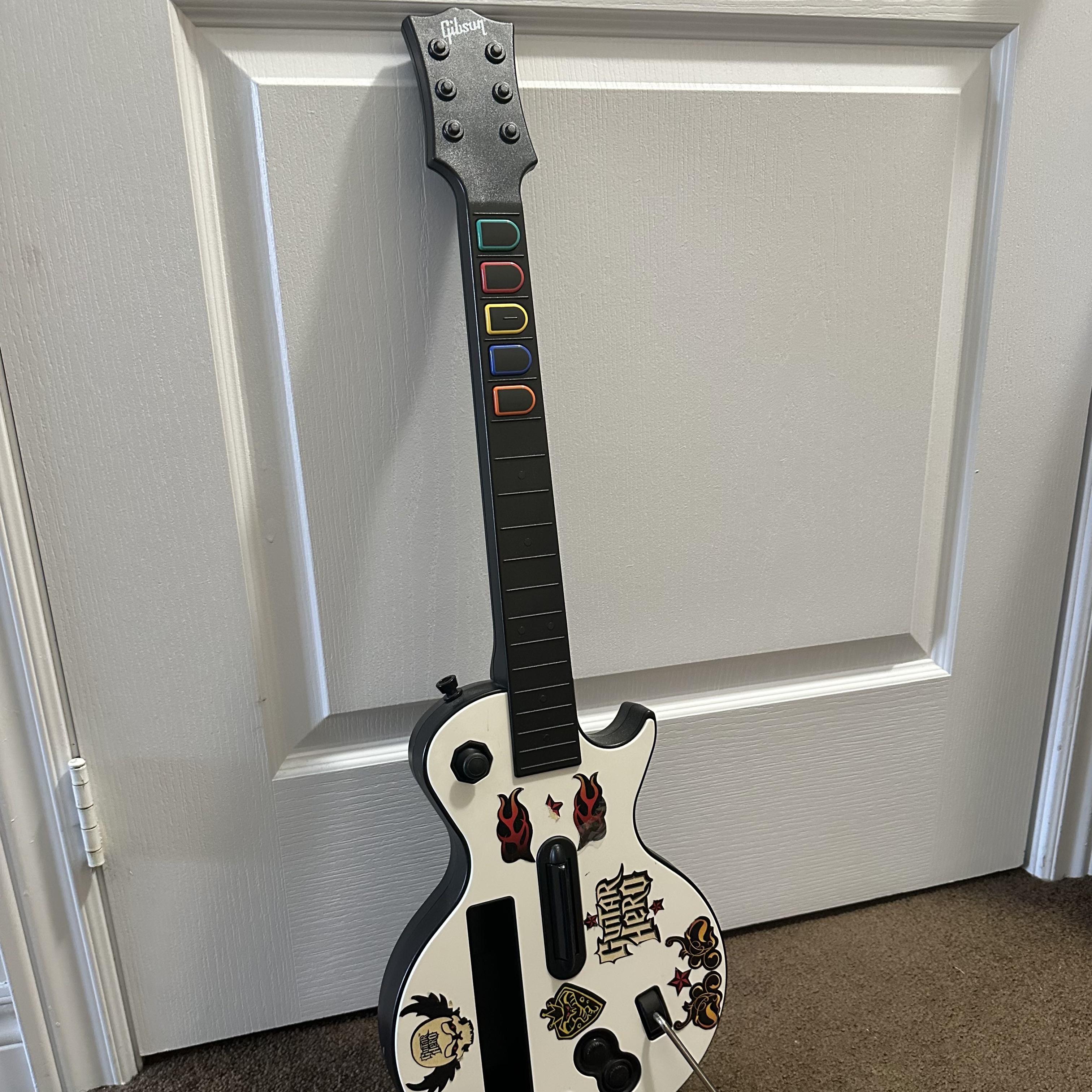 sound of a game guitar being used <br><audio controls src='audio/guitar hero.m4a'></audio>