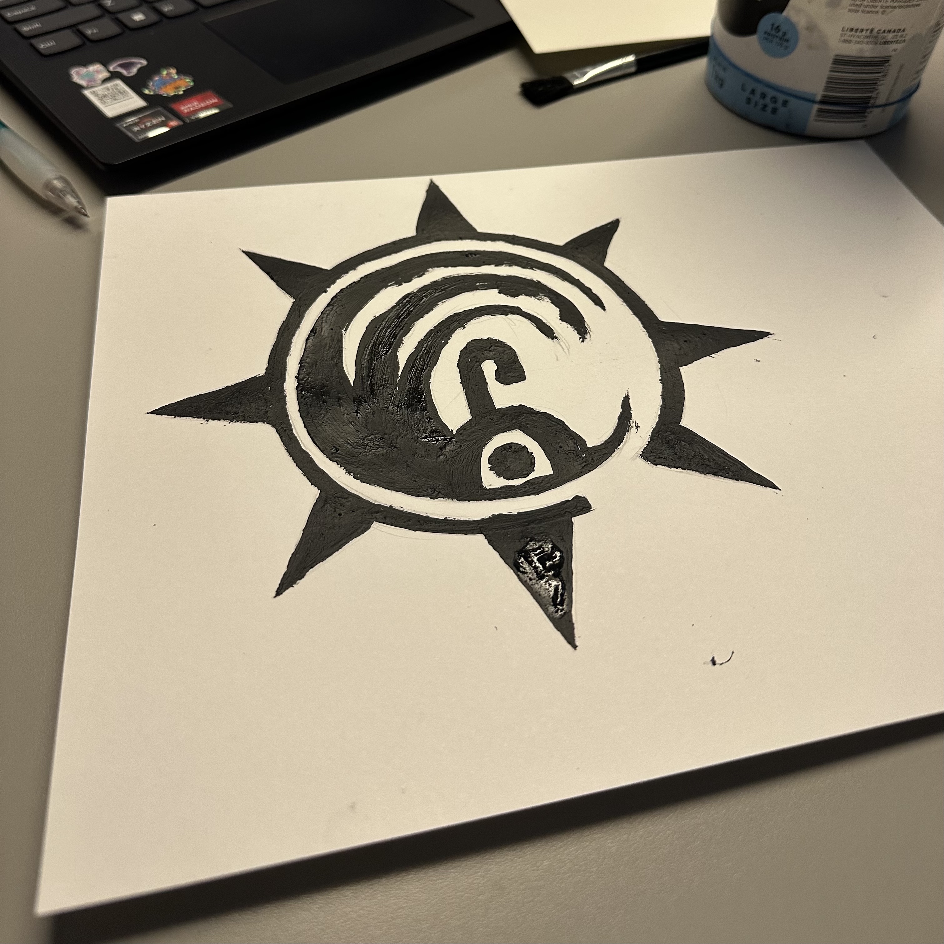 I began the exploration using conductive paint provided to us in class. The first symbol I decided to paint was from an anime, Gachiakuta. The symbol is very eye catching and has separate areas that make it easy to touch. It was hard using the paint at first because the paint was thick, so creating hard edges needed slower strokes.